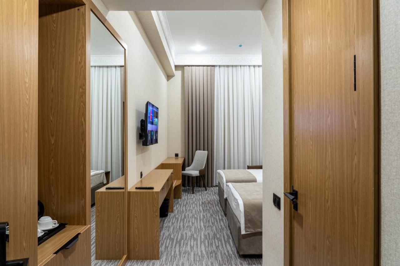 Mirzo Hotel Ташкент Экстерьер фото